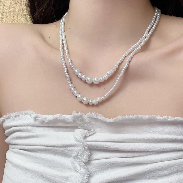 Irregular multi-layer stacking wearing long pearl necklace French light luxury temperament sweater chain simple high-end neck chain tide
