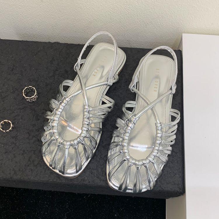 Baotou Roman sandals women's summer 2025 summer new French woven flat-bottomed pig cage shoes fairy strap soft sole