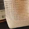 Woven Straw Tote with Tassel Accent and Spacious Interior for Summer Beach or Casual Daily Use