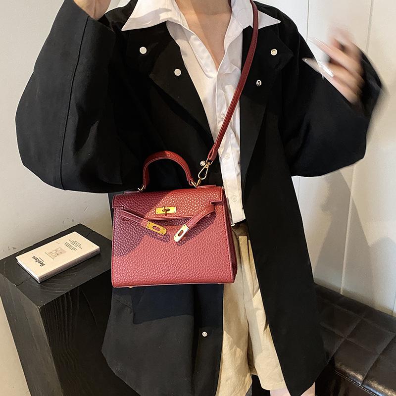 Neue hochwertige Tragetasche für Damen im Lychee-Muster, Größe Kaibaoli, tragbar, Schulter-Umhängetasche