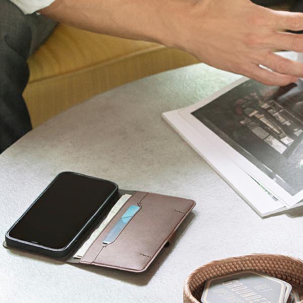 Etui z klapką do iPhone 12 UNIQ Szare