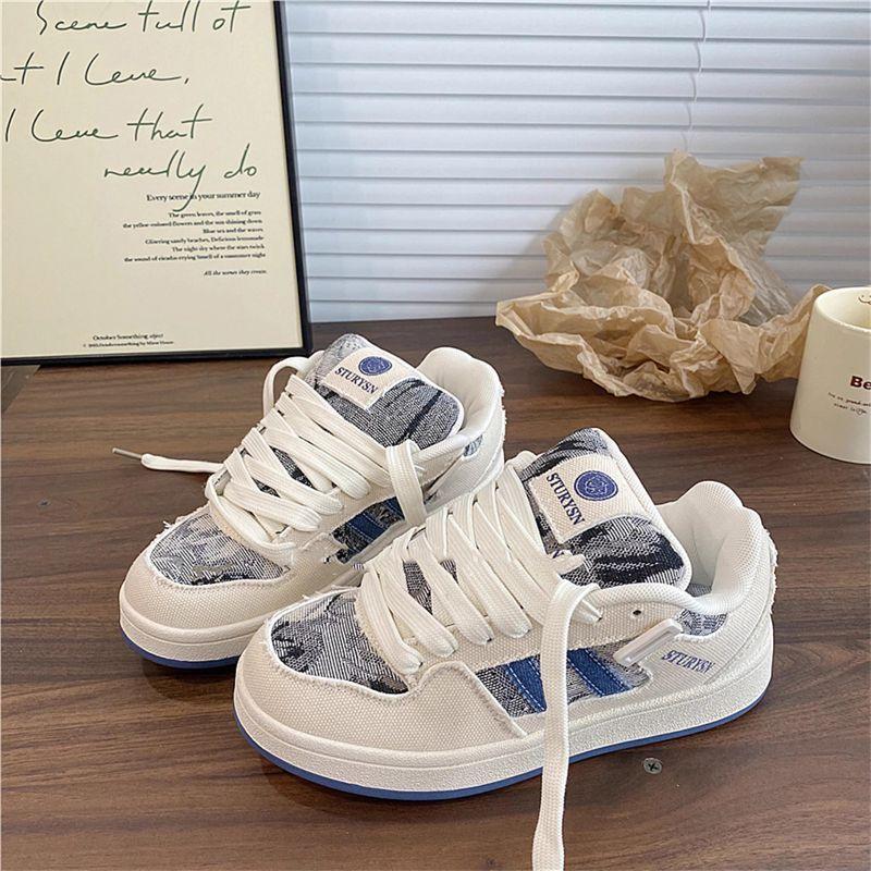 

Classic Internet celebrity white shoes women s canvas shoes 2025 niche casual striped board shoes ins trend couple bread shoes 35