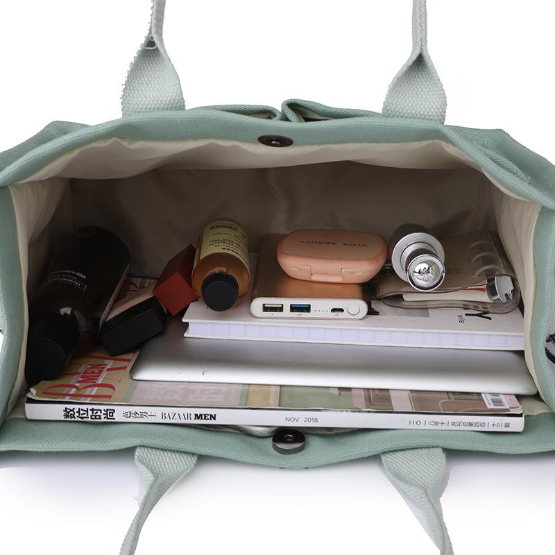 New canvas bag women's large-capacity multi-pocket shoulder bag bag women's high-value messenger bag