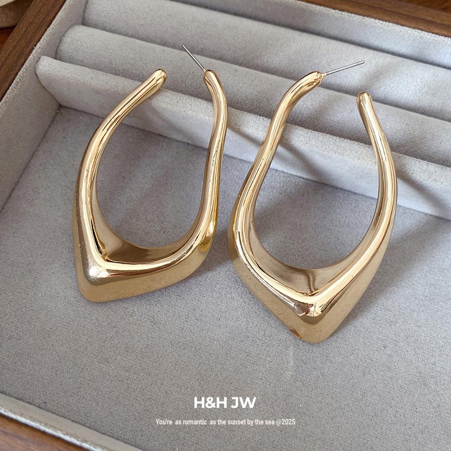 Silver needle geometric irregular hollow earrings light luxury high-end earrings simple cold wind earrings design sense niche