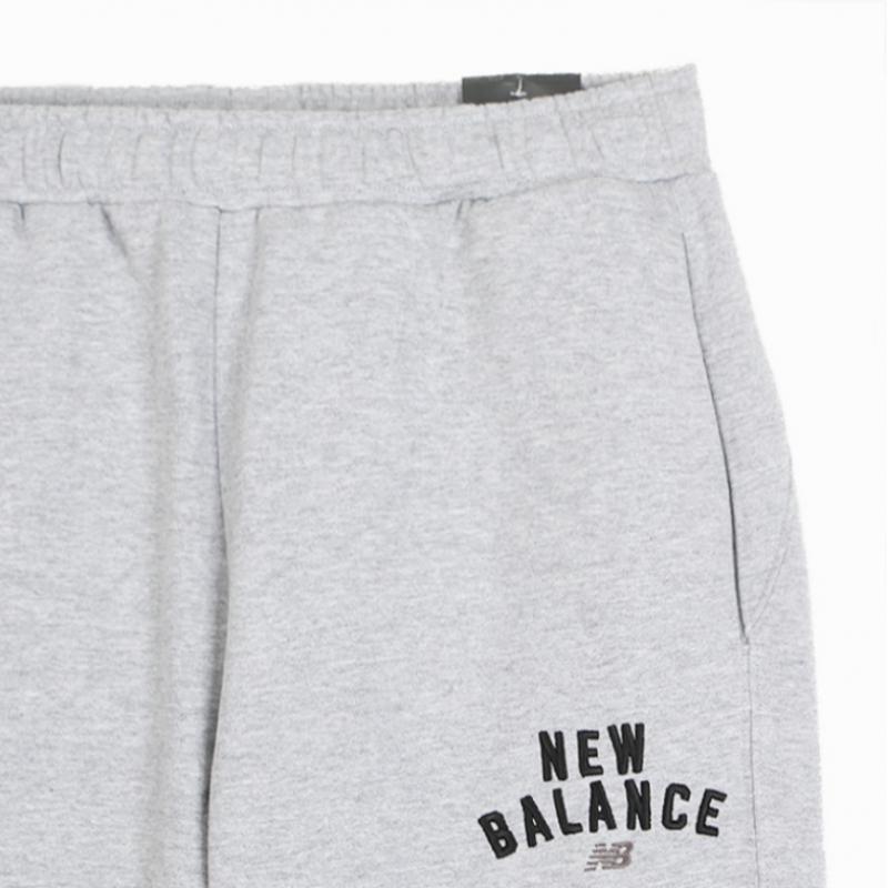 New Balance Pantaloni largi Uni Sports Club Nbmlfco123 Antrenament AC