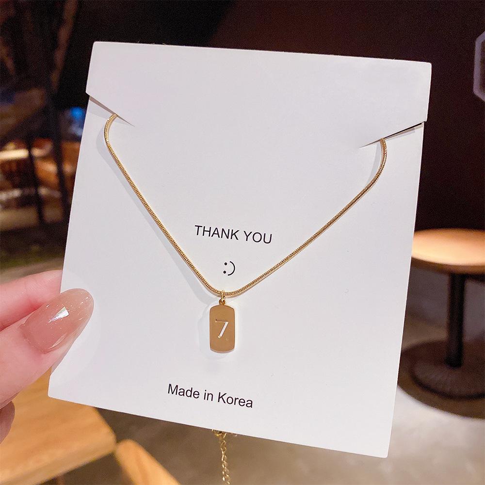 Minimalist Clavicle Necklace: Japanese & Korean Style, Luxurious Real Gold-Plated Titanium Steel Pendant for Women