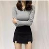 Schwarze knielange Rockhose für Damen - Sommerliche schlankmachende High-Waist-Rockshorts mit Schlitz