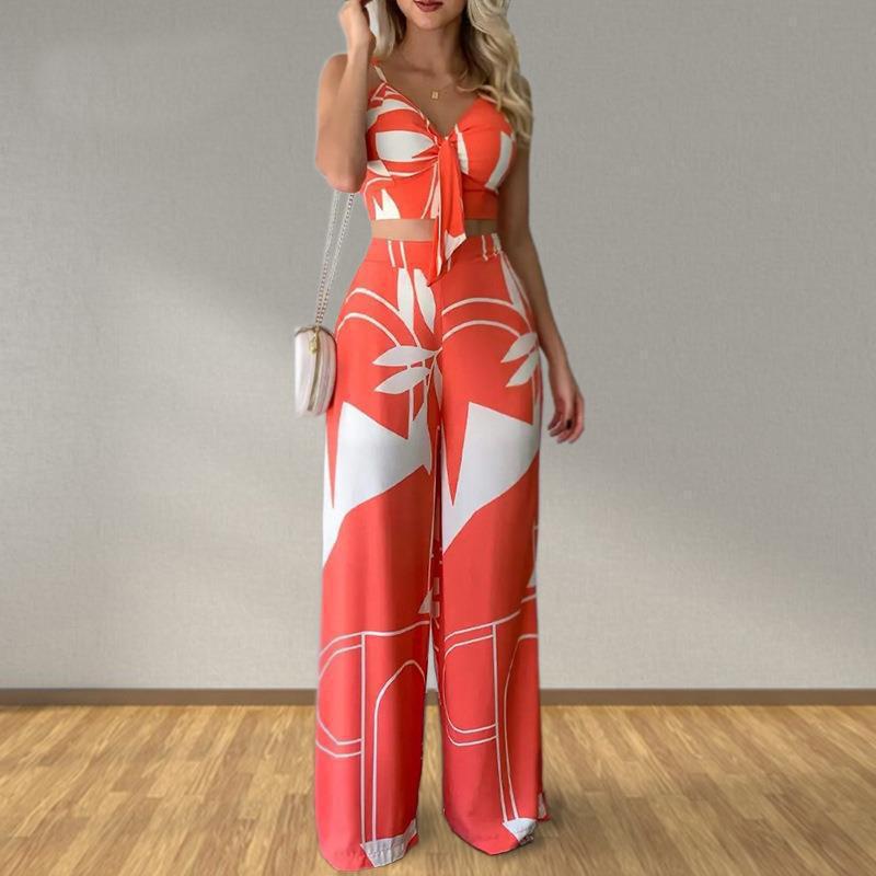 

Women s clothing, new spring models in Europe, America, fashion printing suspender waist and thin wide-leg pants set S оранжевый