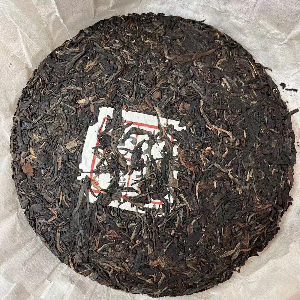 357g Yunnan Old Puerh Tea 2009 Daxueshan Sheng Pu-erh Tea Cake Aged Pu'er Tea