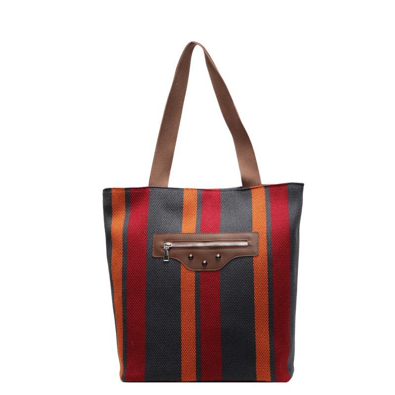 Autumn and winter large-capacity contrasting striped shoulder bag women's new fashion class commuter tote bag