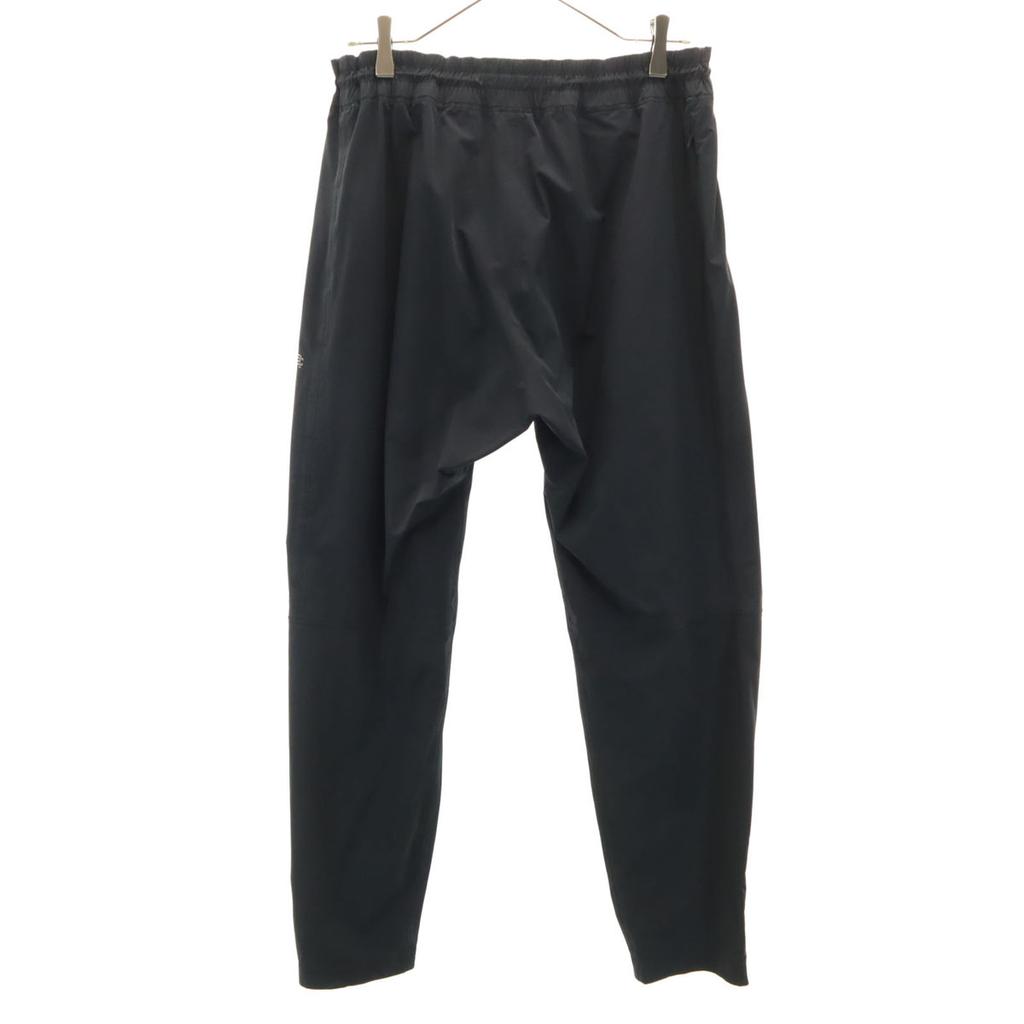 REIGNING CHAMP Spodnie wiatrówki L czarne Męskie Używane