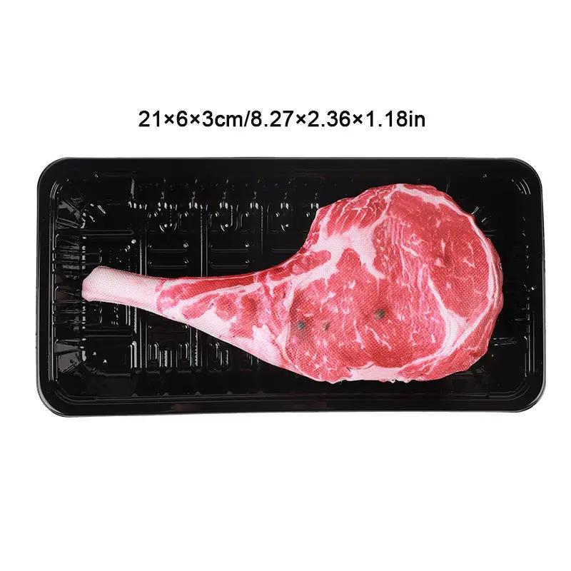 A Simulation Toy of A Dog Chewing Steak with A Tomahawk