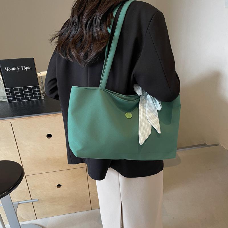 2025 New Korean Version Commuter Tote Bag Women's Large-capacity Handbag with Simple Personality and One Shoulder Fashion Big Bag