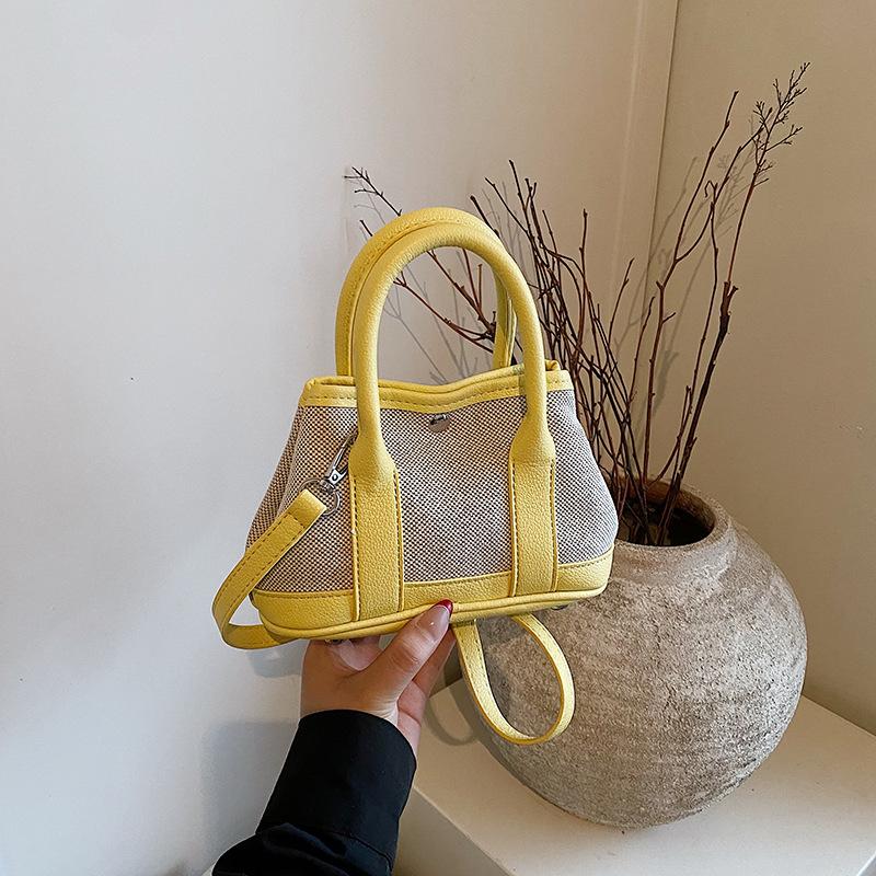 

2025 нишевый дизайн текстурная сумка новая большая вместимость модная сумка-тоут для通勤 контрастного цвета женская 25*11*15