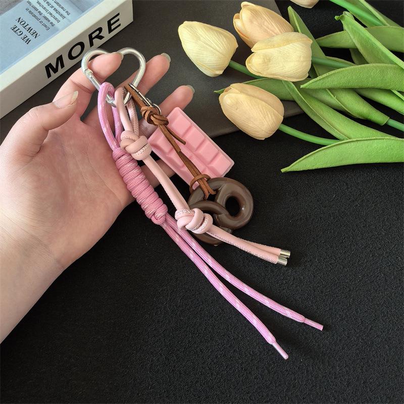 

Cross-Border MIU Series: Alkali Water Bread Bag Pendant - Bagel Chocolate Climbing Rope Keychain Decor розовый