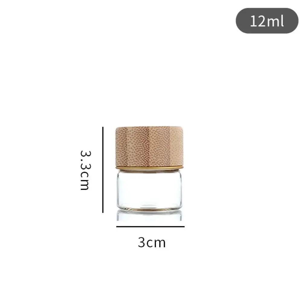 

High Quality Dispensing Bottles Glass Sealed Spice Jars with Wood Lids Transparent Storage Tank Storage Tool Round Spice Jar
