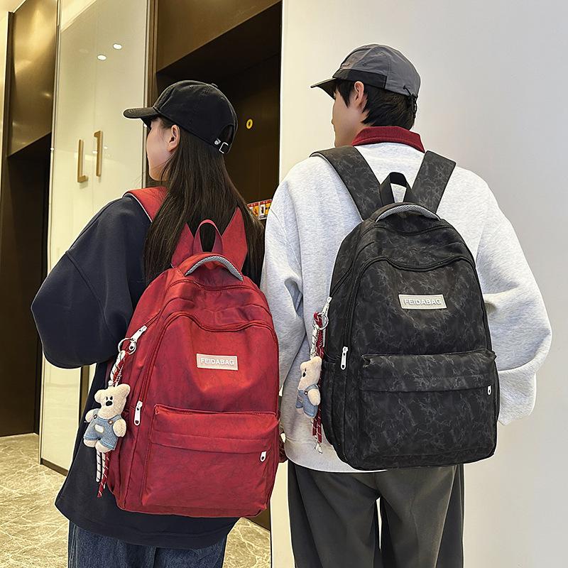 School Bag New Large Capacity Trend Versatile Junior High School Student School Bag Couple Fashion Embossing Simple Casual Lightweight Backpack