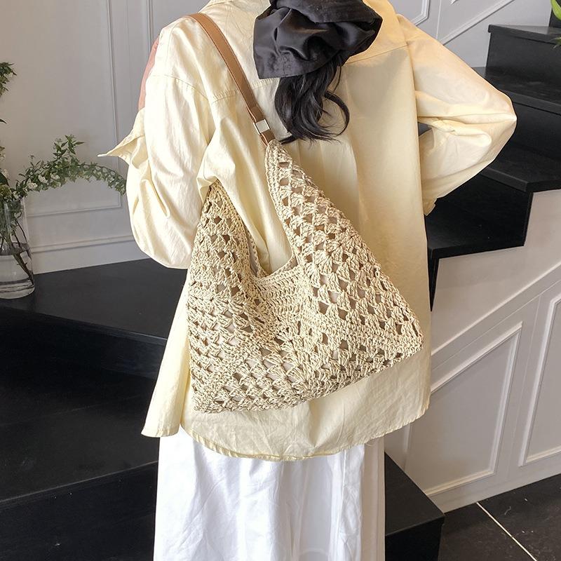 Hohle gewebte Strohtasche Damen große Kapazität neu Sommer Schulter Pendeln Badeurlaub Strandtasche