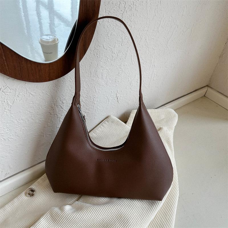 

Foreign style trend armpit bag new bag women s 2024 autumn fashion simple handbag casual personality shoulder bag коричневий