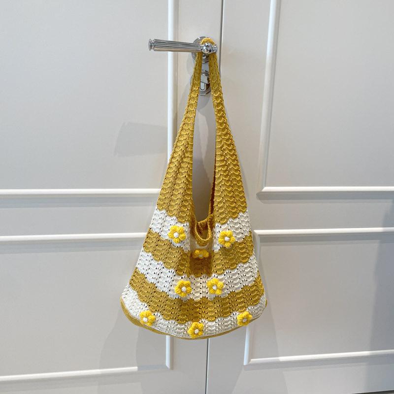 2025 summer striped woven bag niche contrasting color bar knitted bag women s simple hollow portable fashion shoulder bag