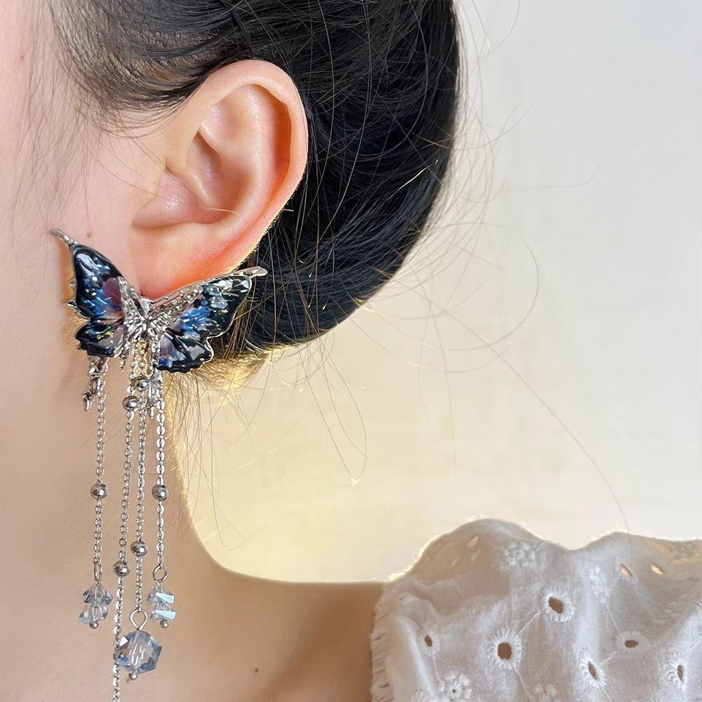 Асиметричні сережки-китички у вигляді червоних метеликів