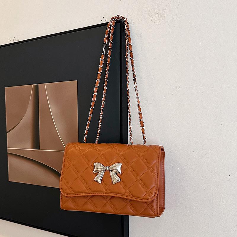 Rhombus casual chain solid color small square bag 2025 autumn new high value foreign style bow shoulder messenger bag