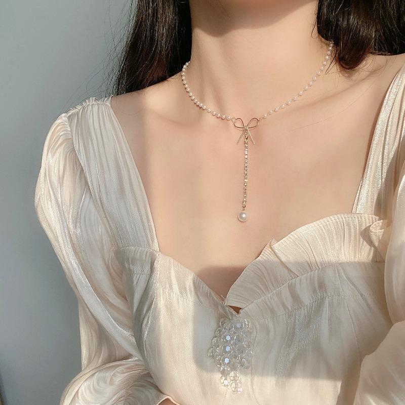Niche bow pearl necklace female cold wind temperament simple collarbone chain neck chain female