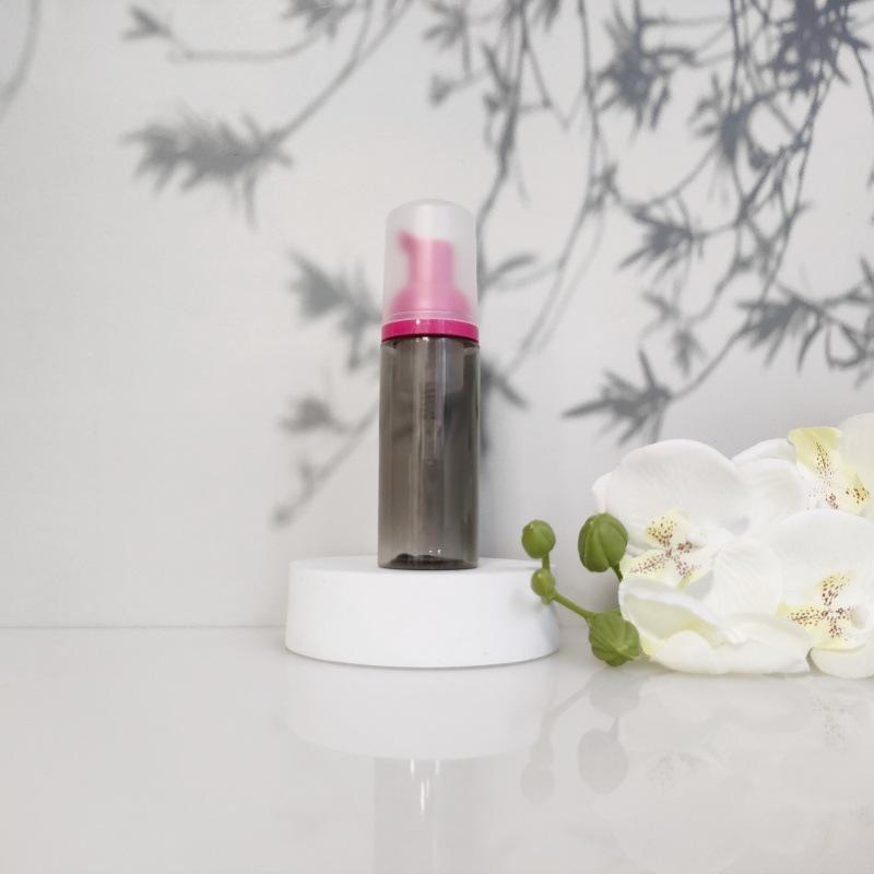 Available 60ml Transparent Black Foam Mousse Bottle for Face Wash and Travel-friendly Cosmetic Packaging.