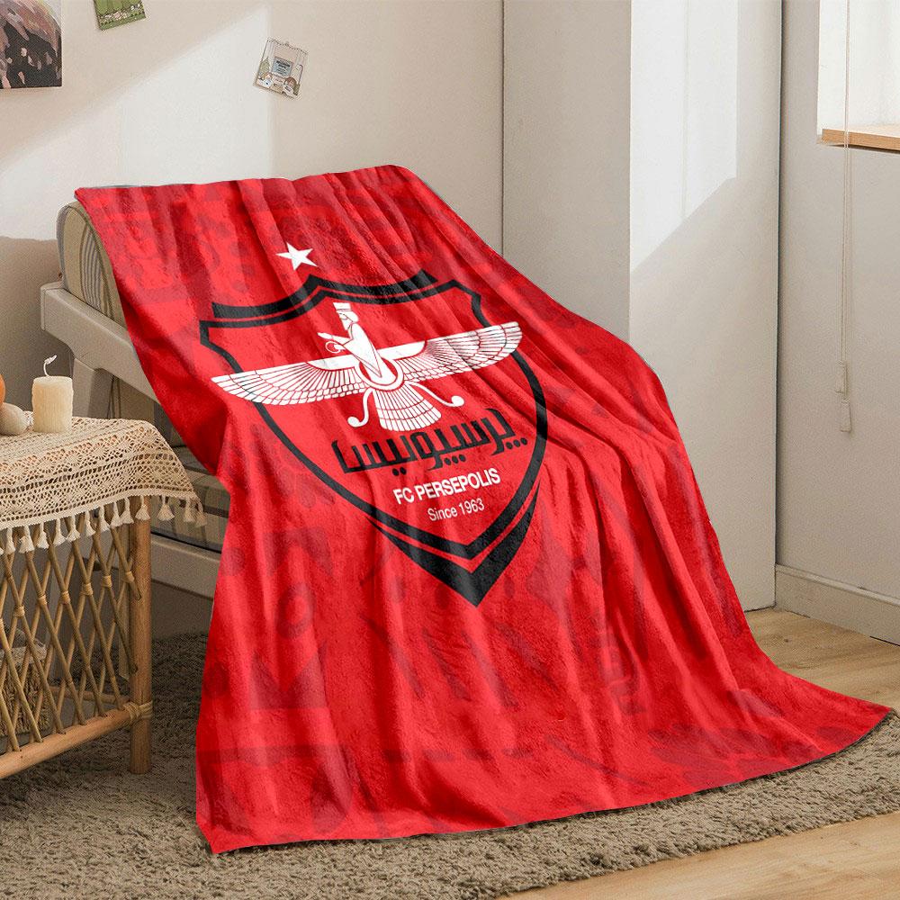 A red background with a central crest, winged figure, and a top white star. for all seasons blanket lunch break throw gift
