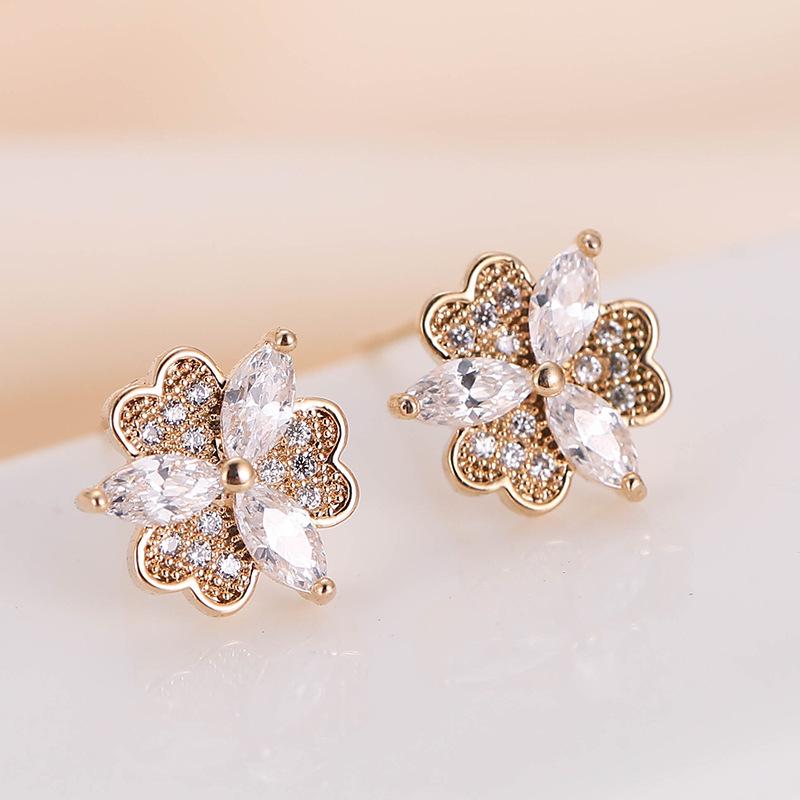 Elegant Rhinestone Copper Stud Earrings for Women - Stylish European and American-Inspired Ear Jewelry.