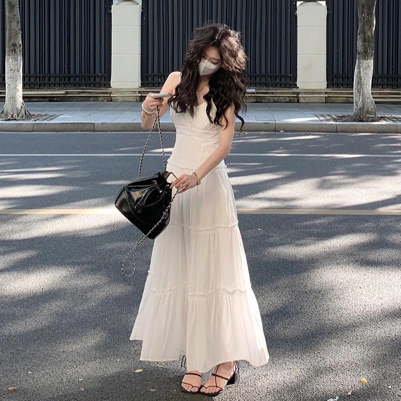 Gentle wind white suspender dress women's 2026 summer new high-end temperament versatile waist and thin dress