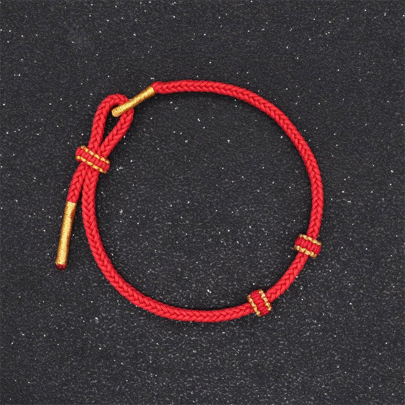 Handgewebtes Achtstrang-Knotenarmband: Halbfertiges rotes Seil mit Anhänger aus Hartgold für Paare