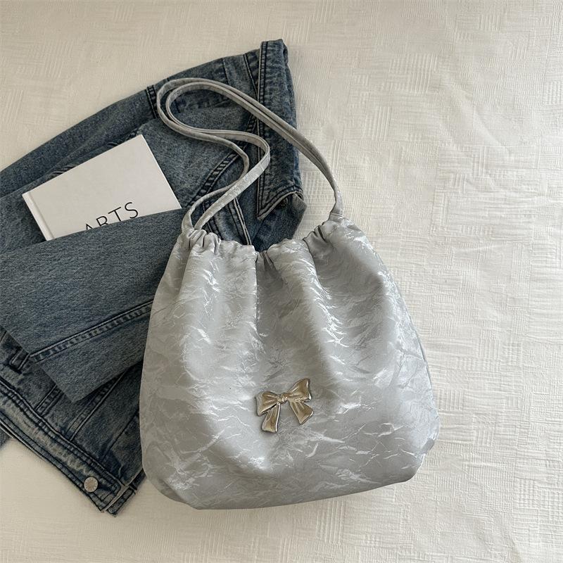 

Рюкзак высокой ценности 2025 новая мода большая вместимость бант студенческая сумка универсальная сумка-тоут серебряный