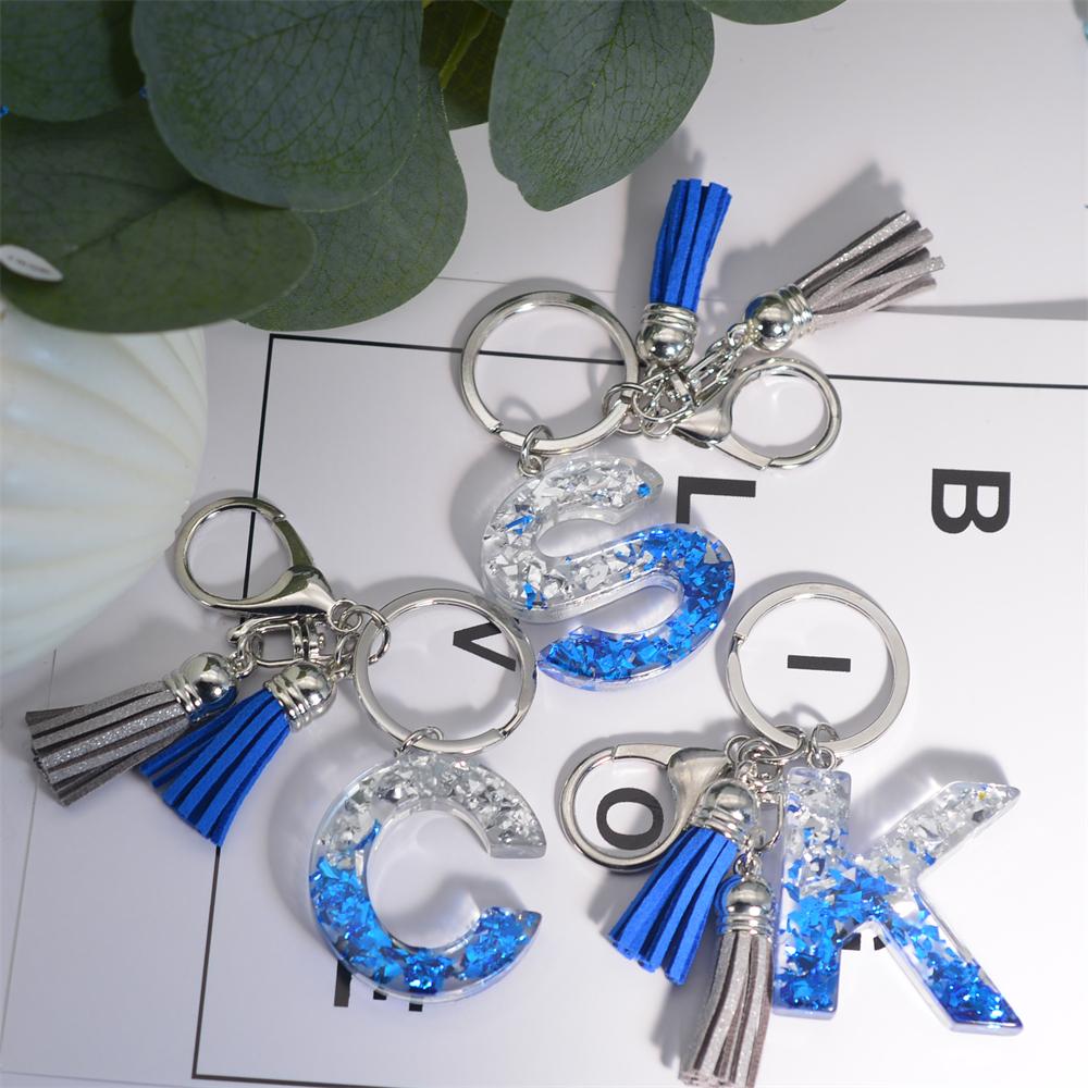 Креативные брелки из смолы с 26 буквами и кисточками — фото 3