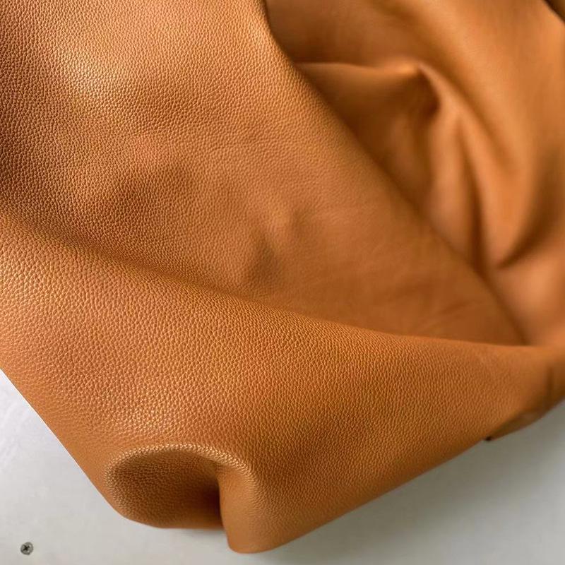 

Черные сумки из коровьей кожи с зернистой текстурой личи и кожаные изделия оранжевый