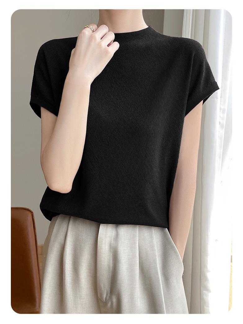 

Женский жилет из мериносовой шерсти с полувысоким воротом, короткими рукавами и свободного кроя - однотонный, модный и универсальный вязаный пуловер Medium чёрный