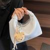 Korean version of fashionable simple high-quality textured wrist dumpling bag niche casual versatile commuter messenger crescent bag women
