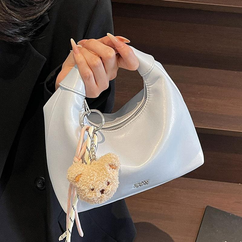 Korean version of fashionable simple high-quality textured wrist dumpling bag niche casual versatile commuter messenger crescent bag women