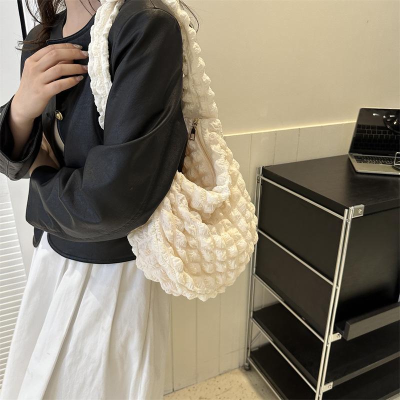 Popular fashion simple temperament commuter pleated bag women's 2025 one-shoulder armpit bag hand-held bucket bag trendy