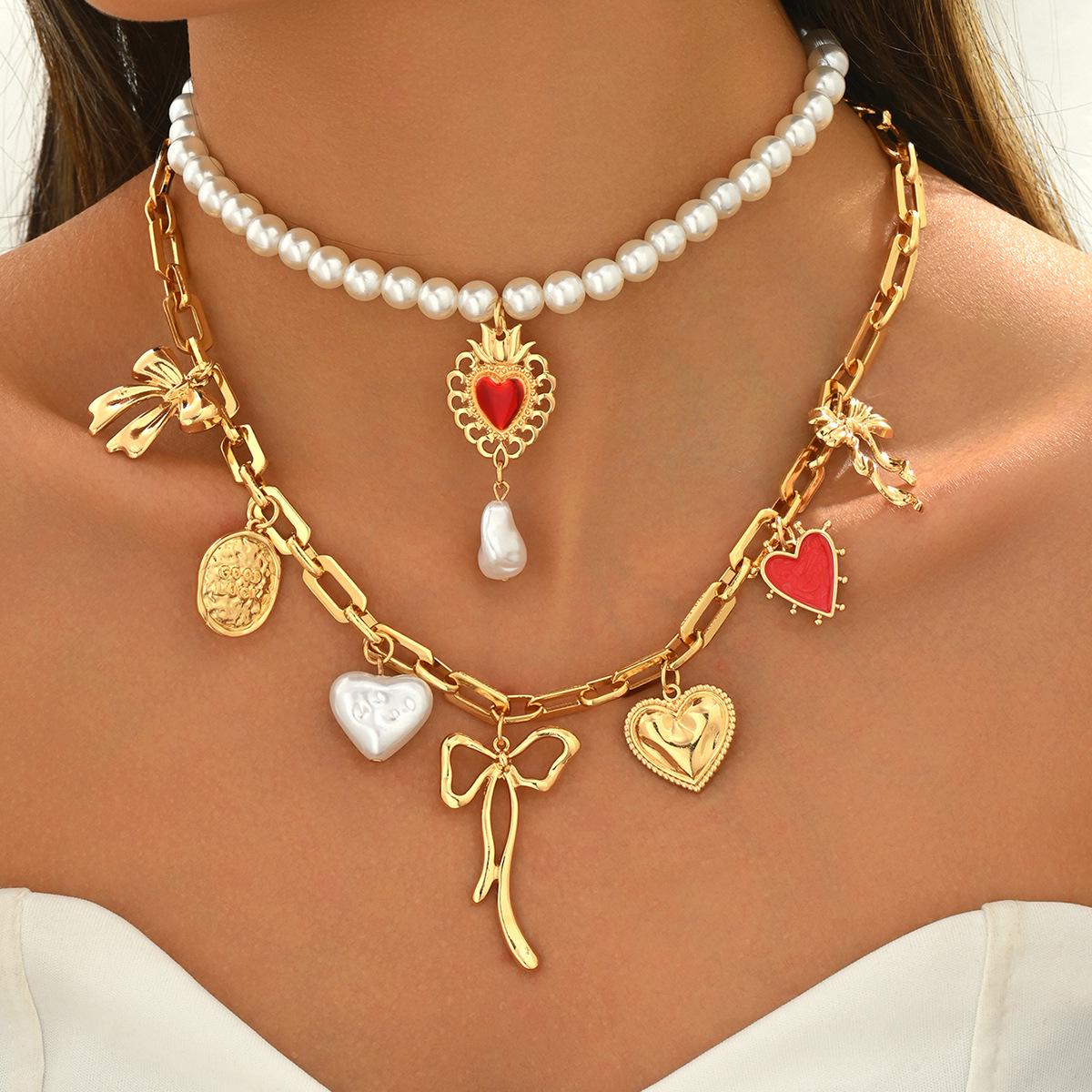 

Elegant Heart & Bow Pendant Necklace with Pearl Beaded Chain