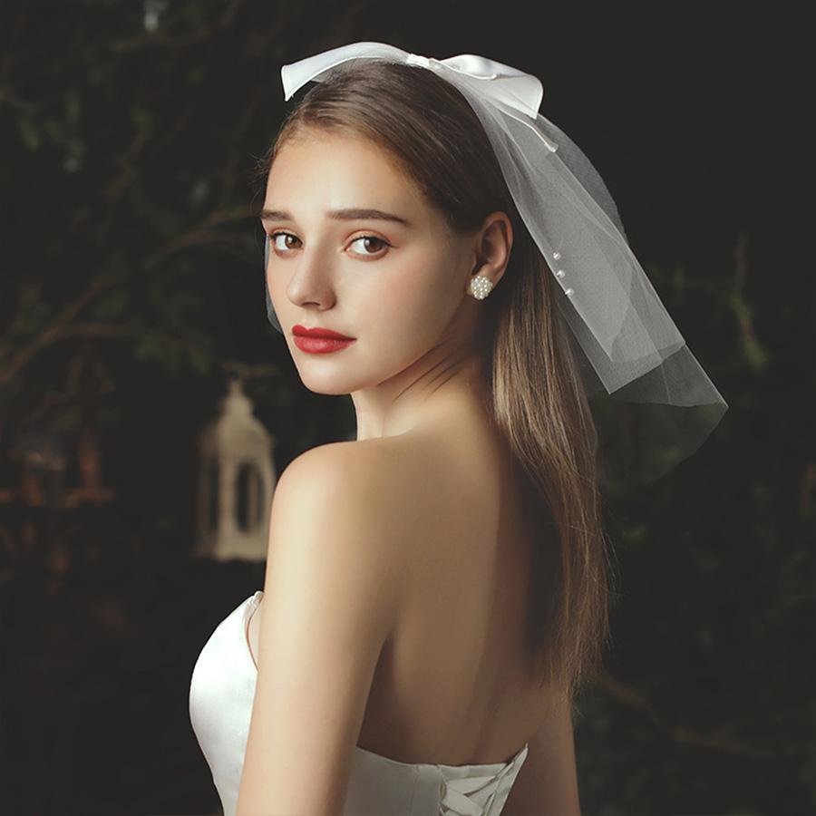 Elegante Hochzeit Braut Hochzeit Kopfschmuck Weißer Schleier Kopfschmuck Imitationsperle Schleife Kurzer Schleier Hinterkopfdeko Haaraccessoires