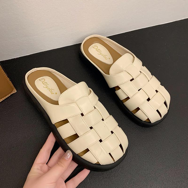 Baotou slippers women's high-end beach shoes summer 2025 new seaside woven with skirt cool slippers