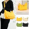 Women's Stylish Drawstring Crossbody Bag Fashionable Sling Purse with Secure Zipper & Decorative Charm
