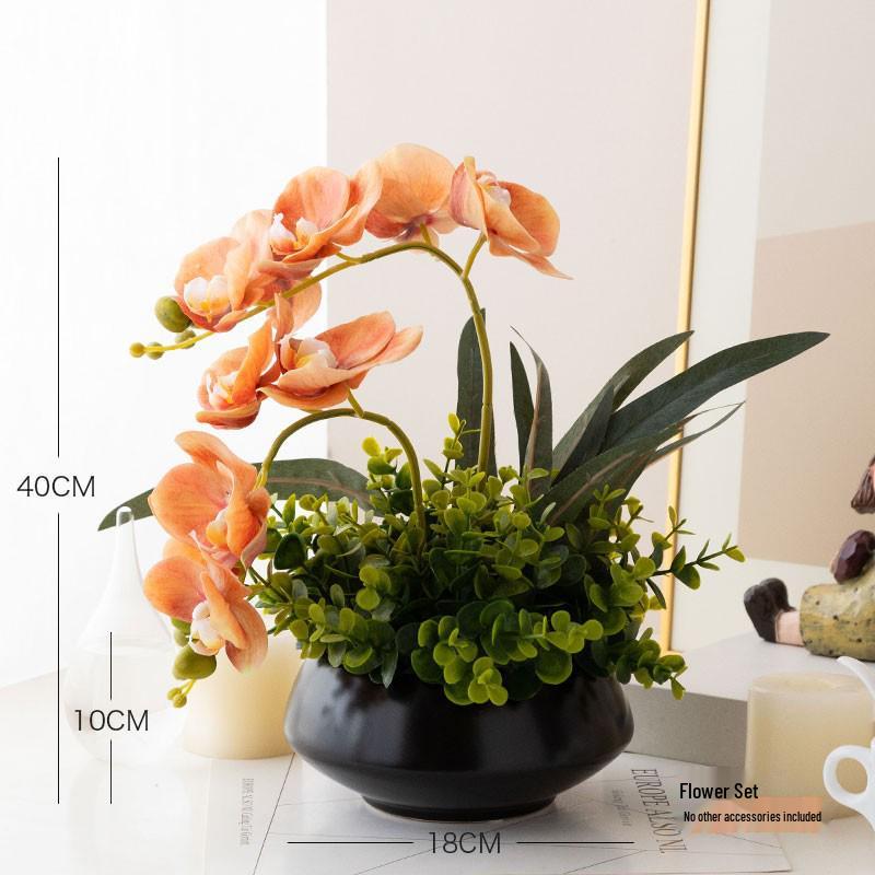 Nordisk modern sommarfräsch inomhuskonstgjord blombukett med gröna krukväxter