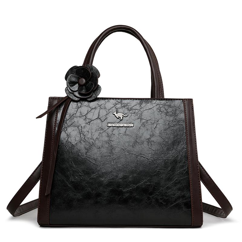 Elegant Faux Leather Tote Bag with Flower Decoration and Adjustable Shoulder Strap