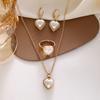 Niche minimalist design  peach heart necklace jewelry set creative French love earrings ring three-piece set