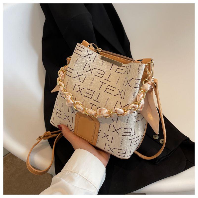 

Модная сумка-ведро в корейском стиле, которую легче всего сочетать по текстуре, сумка-ведро для моды интернет-знаменитостей Beige White