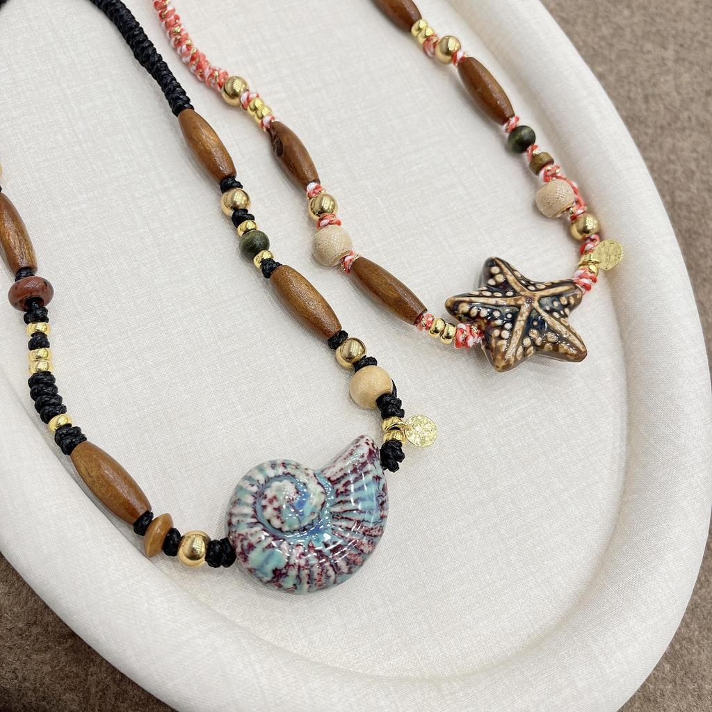 Retro Conch Long Necklace for Women: Unique Niche Design, High-End Sweater Chain, Versatile Accessory for Autumn & Winter