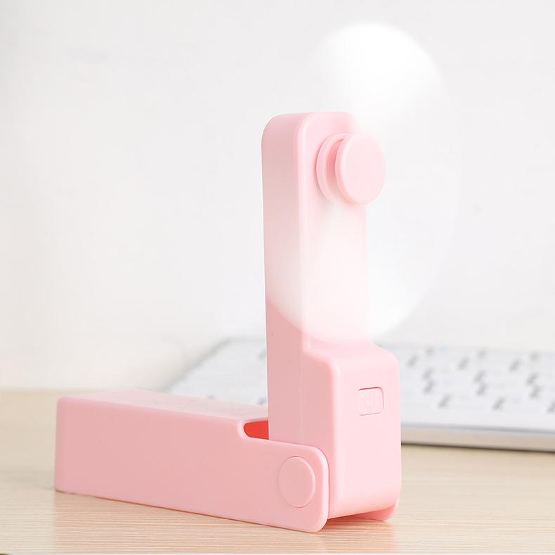 

Карманный складной ручной электрический вентилятор, портативный мини-вентилятор для зарядки, летний теплоотвод и прохладный уличный продукт Charging version розовый