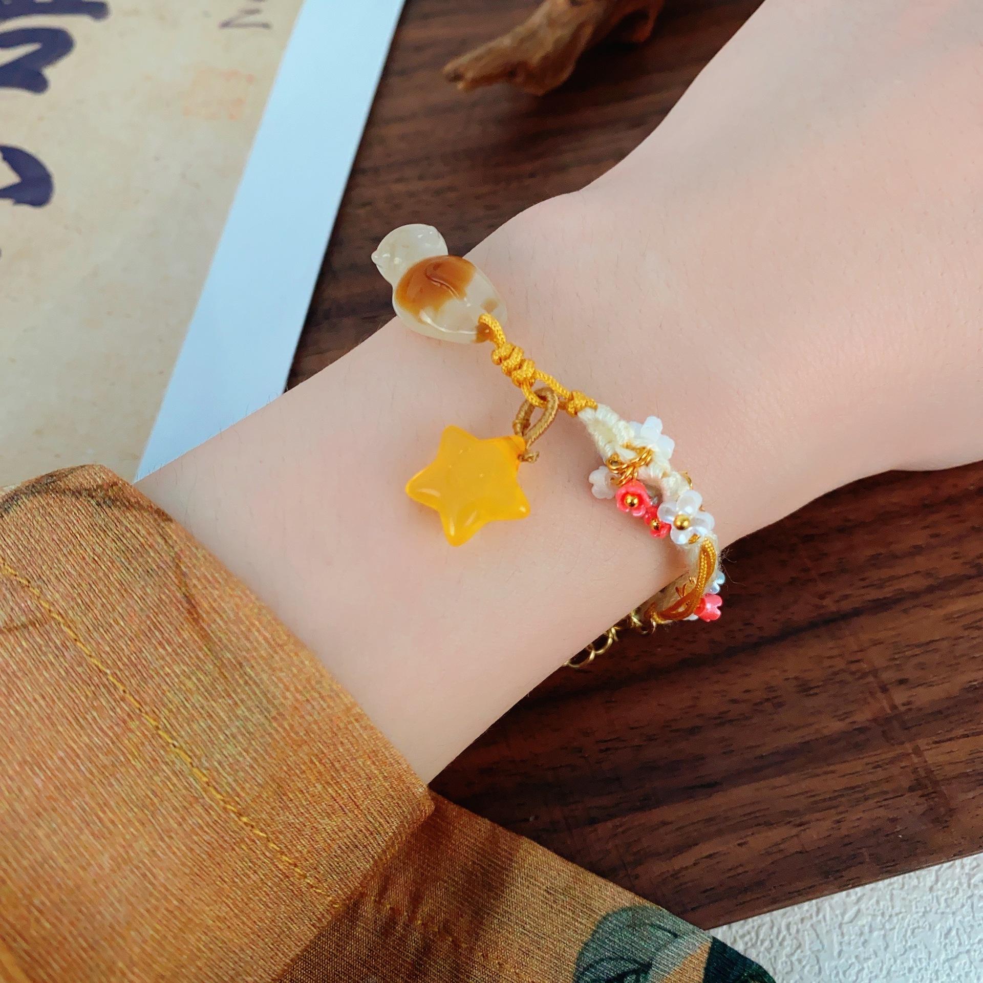 

New Chinese fat orange cat star woven bracelet light luxury niche design high-end bracelet sweet and versatile accessories